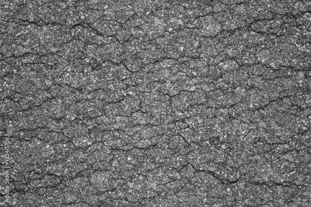 Asphalt background texture with some fine grain in it background Asphalt background texture with some fine grain in it background