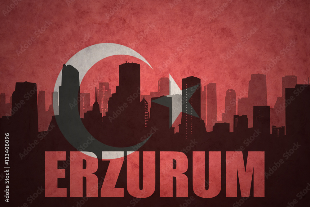 abstract silhouette of the city with text Erzurum at the vintage turkish flag background