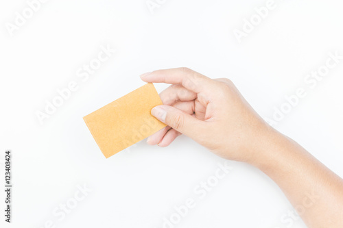 Hand holding paper on white background