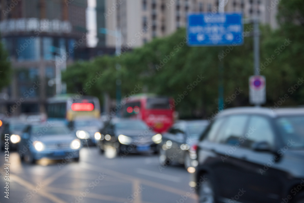 Shanghai street view with cityscape in background.