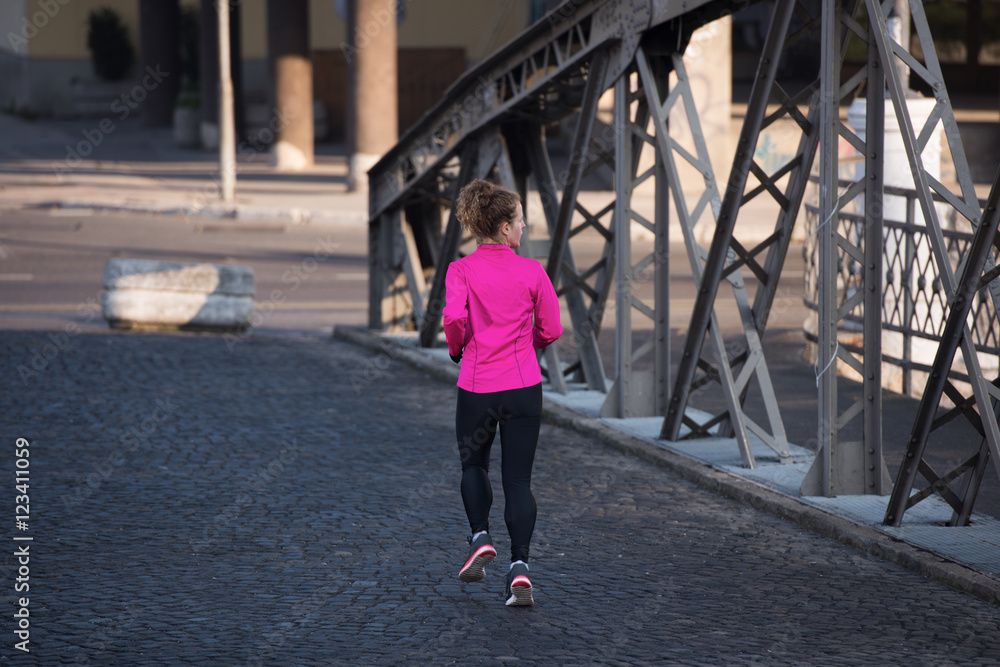 sporty woman jogging on morning sporty woman jogging on morning