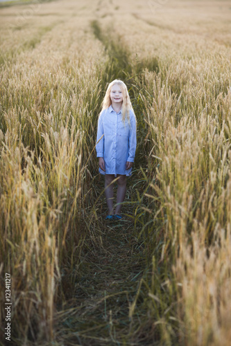 girl in wheat field © chesterF