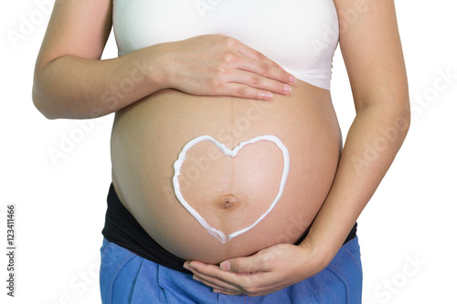 Wallpaper Mural Pregnant woman hand lotion shape heart help skin belly. Torontodigital.ca