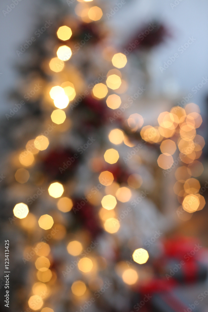 Defocused abstract multicolored bokeh lights background.