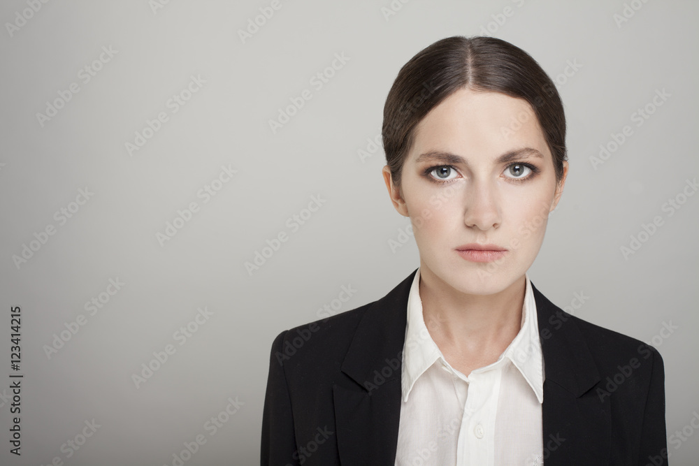 Beautiful young woman looking serious and focused with copy spa Beautiful young woman looking serious and focused with copy spa