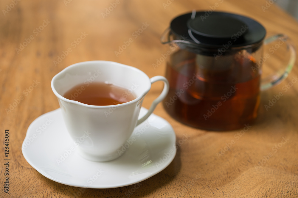 Cup of tea on wooden table. shallow depth of field Cup of tea on wooden table. shallow depth of field