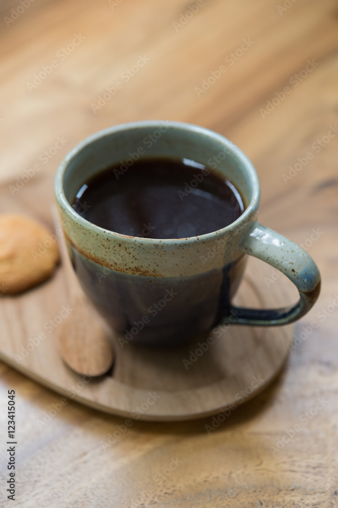 Americano black coffee on a wooden table. shallow depth of field