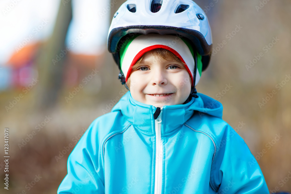 Portrait of little kid boy in bicycle helmet Portrait of little kid boy in bicycle helmet