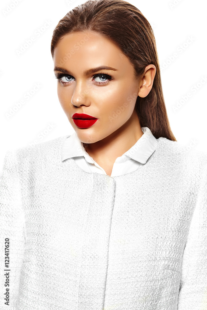 High fashion look.glamor closeup portrait of beautiful sexy stylish brunette young woman model with bright makeup and red lips isolated on white High fashion look.glamor closeup portrait of beautiful sexy stylish brunette young woman model with bright makeup and red lips isolated on white