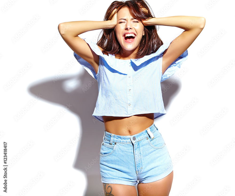 Portrait of beautiful girl model in casual summer clothes with no makeup on white background Portrait of beautiful girl model in casual summer clothes with no makeup on white background