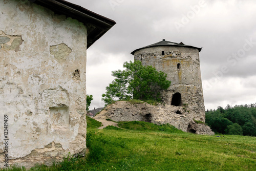 Gremyachaya Tower in the city of Pskov in cloudy weather photo