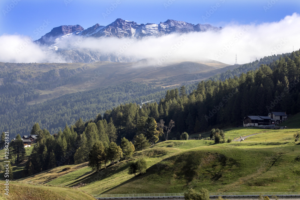 Fototapeta premium morning fog on the Italian Alps, Italy