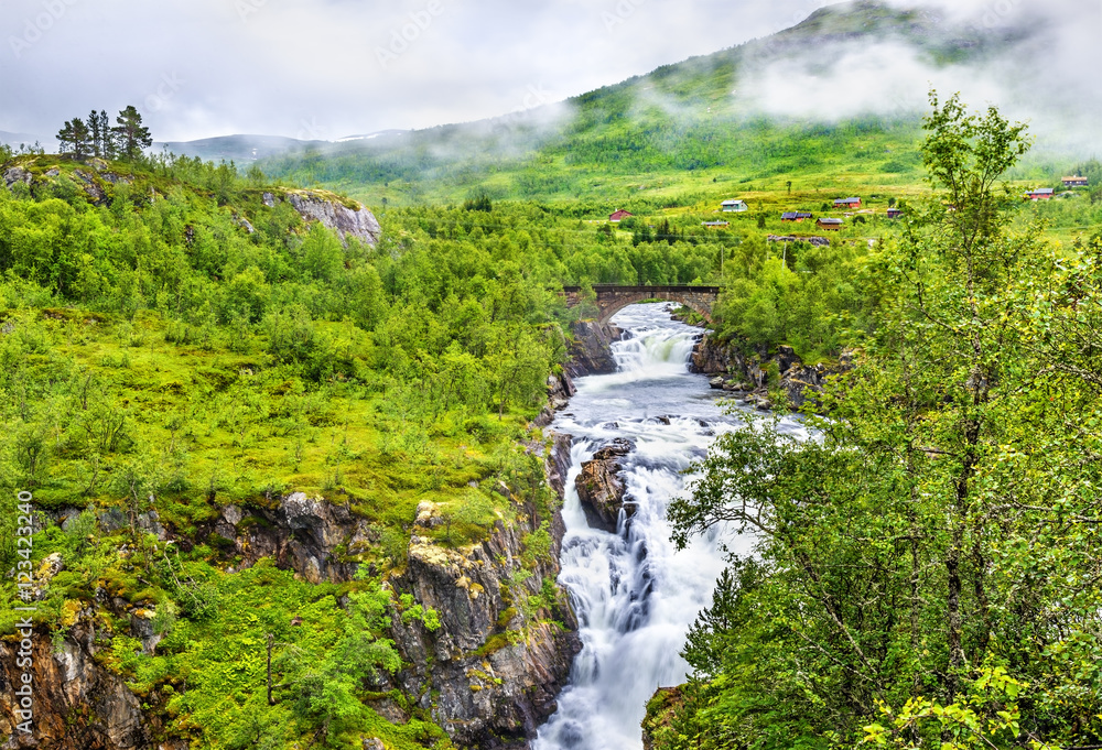 Voringsfossen waterfall on the Bjoreia river in Hordaland - Norway Voringsfossen waterfall on the Bjoreia river in Hordaland - Norway