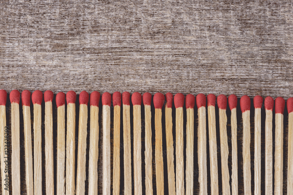pile of matchsticks arrange in a row