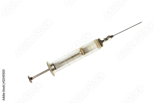 old medical syringe with a needle