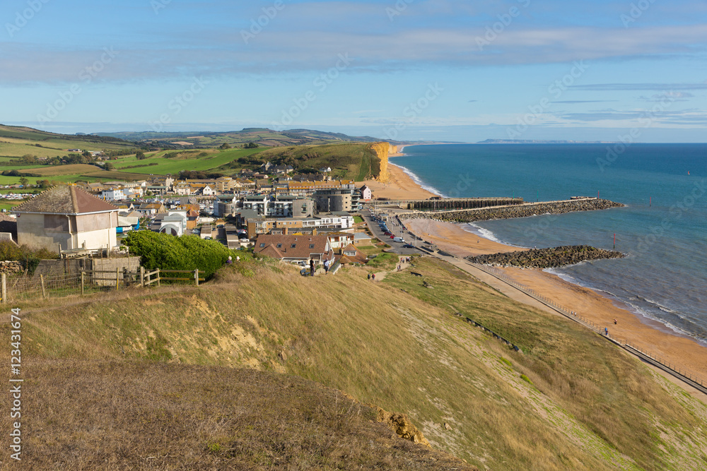 West Bay Dorset uk coastal town a beautiful summer day with blue sky and sea