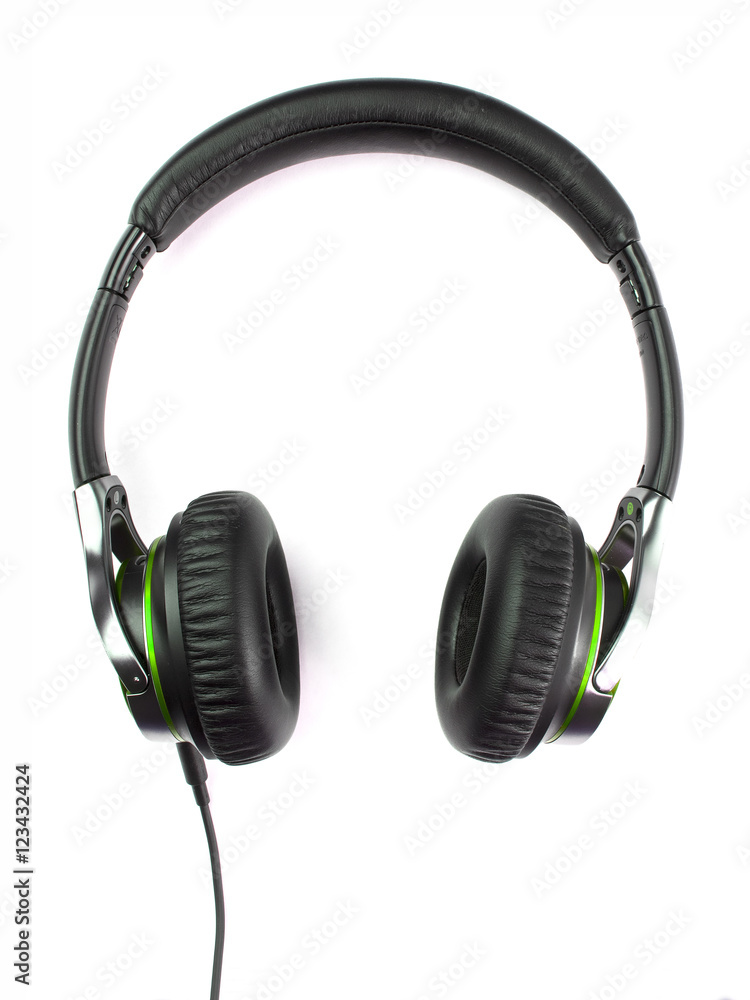 Auriculares color verde claro sobre fondo blanco Auriculares color verde claro sobre fondo blanco