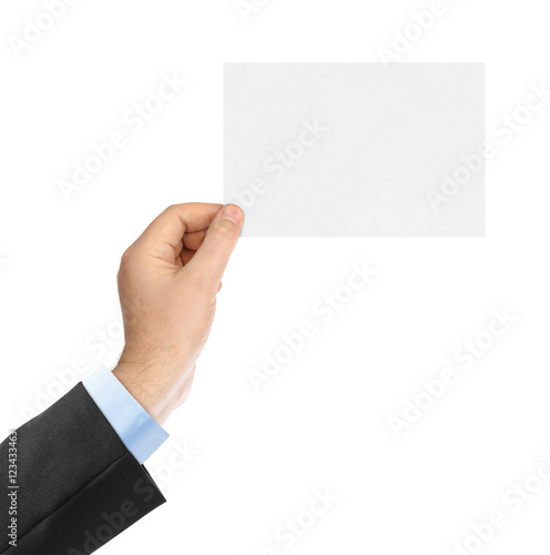 Blank paper card in hand