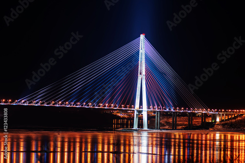 night view of the longest cable-stayed bridge in the world in the Russian Vladivostok over the Eastern Bosphorus strait to the Russky Island
