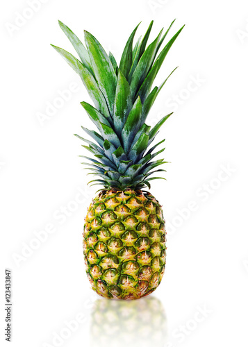 Ripe whole pineapple isolated on white background.