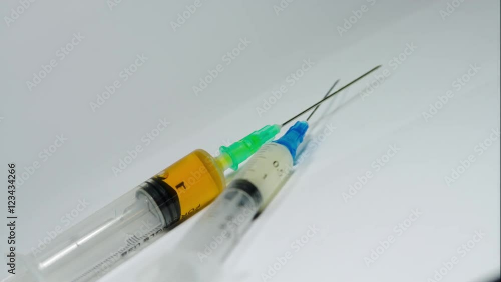 Dutch Angle Of Syringes With Medicine On A Medical Tray, Pan Stock