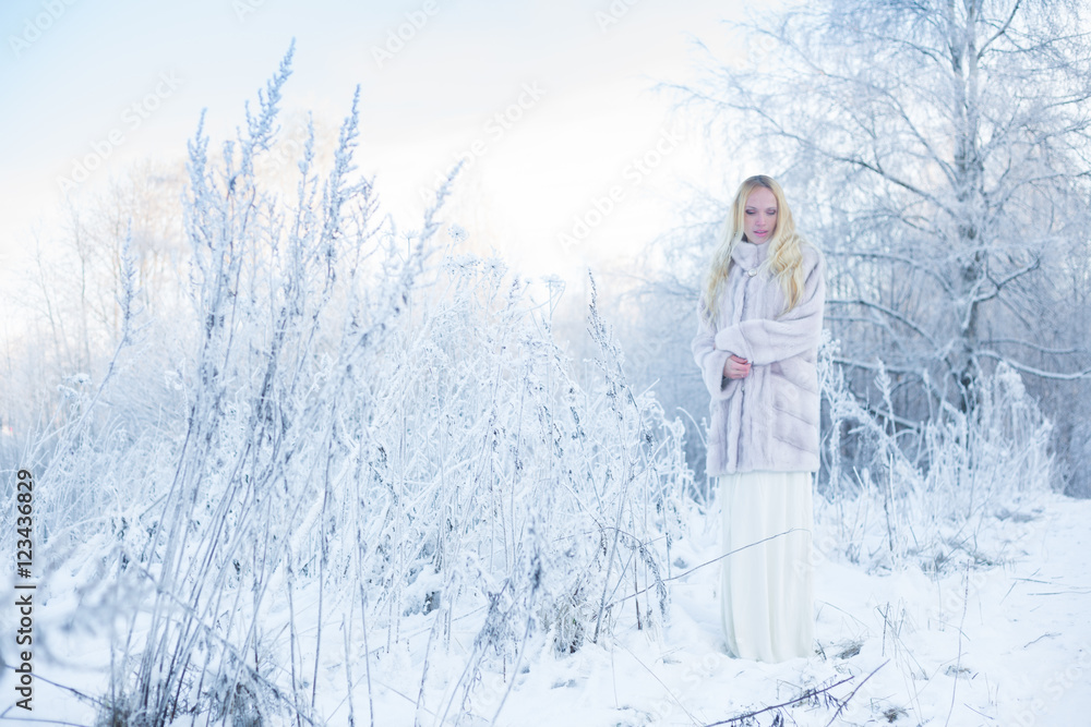 Model in winter forest