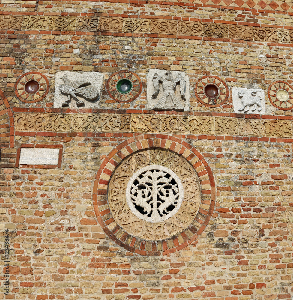 Detail in the wall of ancient Abbey of Pomposa in Italy