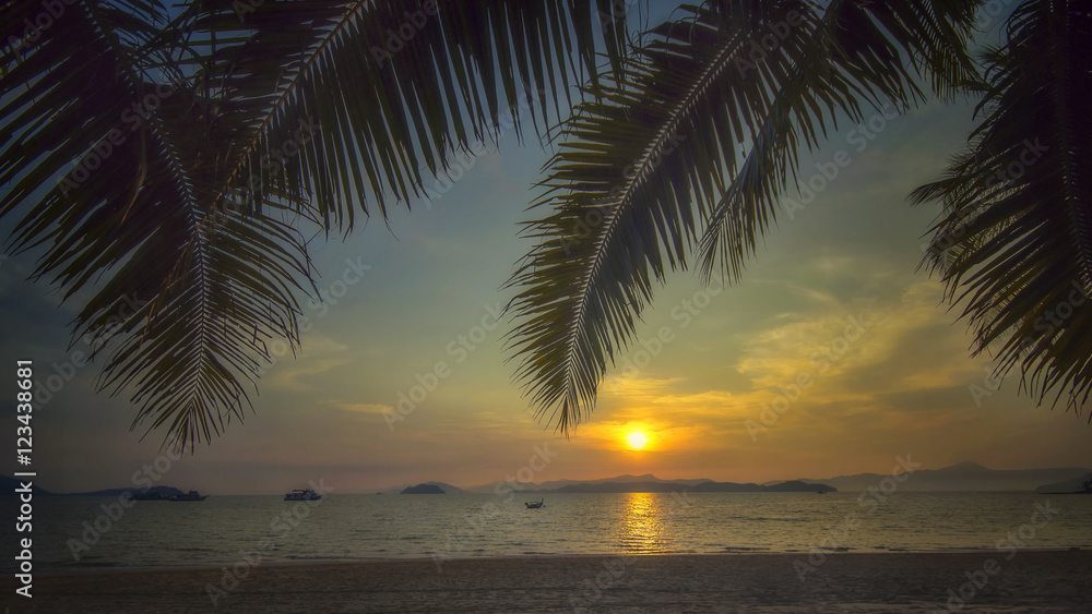 Sunrise on tropical beach background at Phayam island in Ranong province, Thailand. Happy summer holiday concept