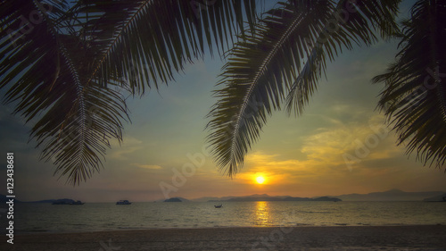 Sunrise on tropical beach background at Phayam island in Ranong province, Thailand. Happy summer holiday concept © smshoot