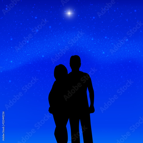 Silhouette couple in love background of stars
