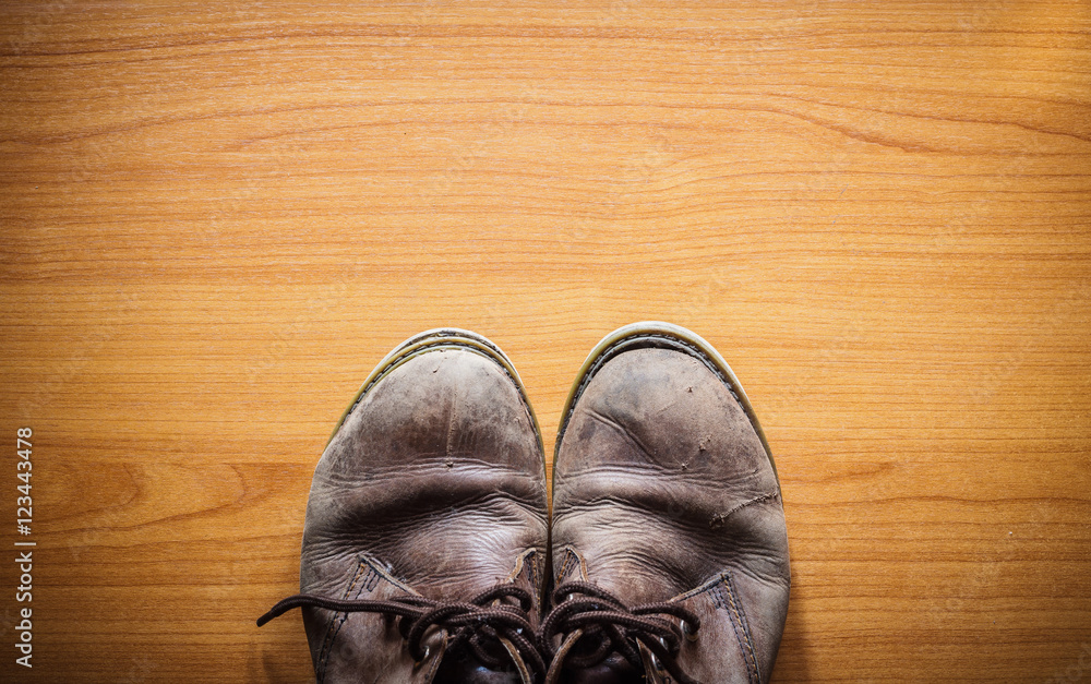 Brown leather shoes on wooden, top view. Brown leather shoes on wooden, top view.