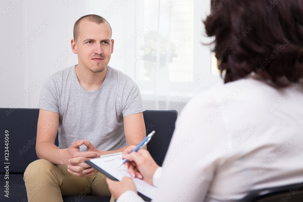 happy young man at interview in office happy young man at interview in office
