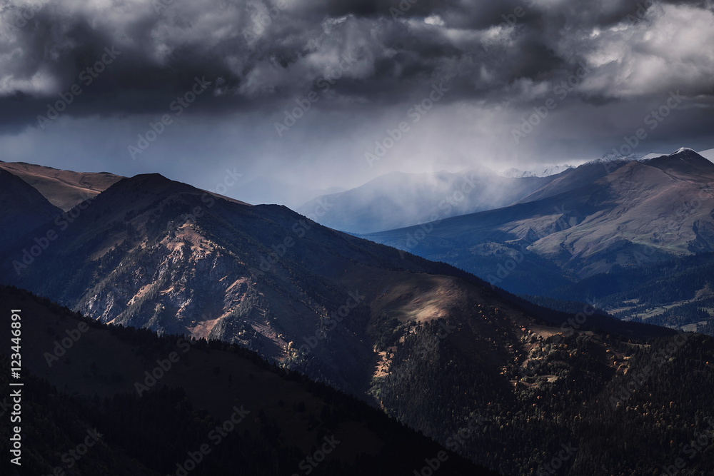 Stormy and dramatic clouds over the Caucasus mountains Arkhyz, Russia