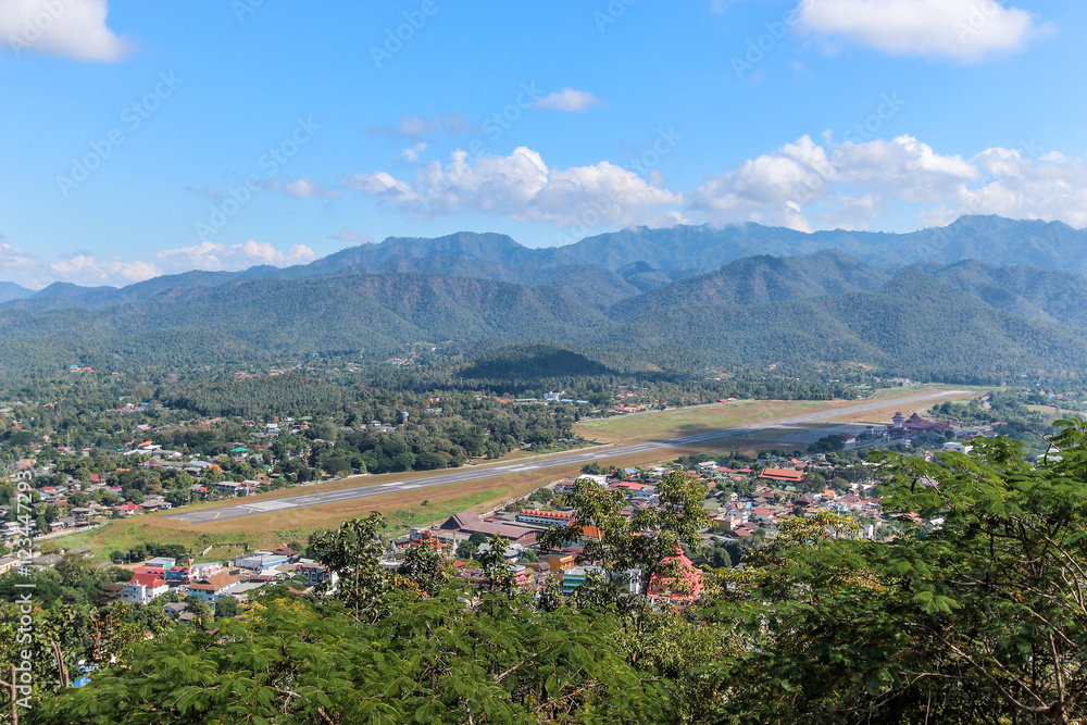 Aerial view of Mae Hong Son city and runway airport in Thailand.