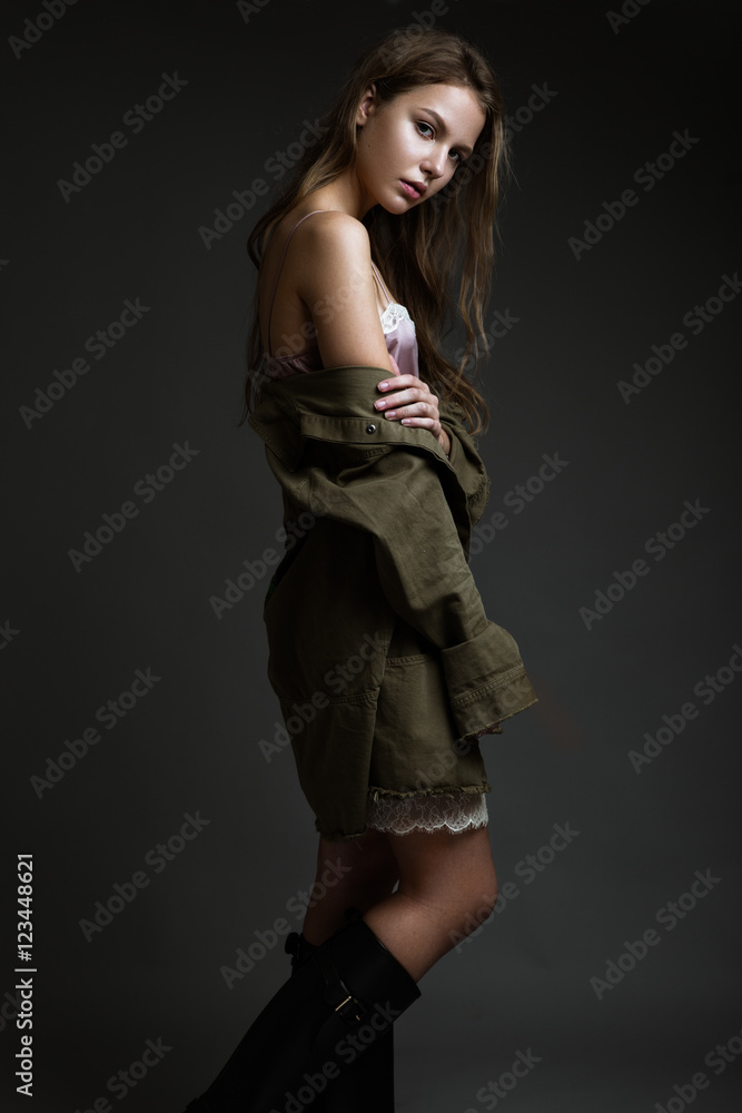 Attractive beautiful fashionable woman in everyday clothes, nude make-up, showing different poses in the studio. Beauty face and body. Test Shots. Attractive beautiful fashionable woman in everyday clothes, nude make-up, showing different poses in the studio. Beauty face and body. Test Shots.