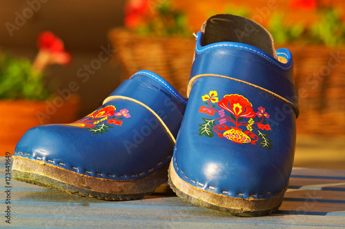 Swedish wooden clogs with decoration. photo