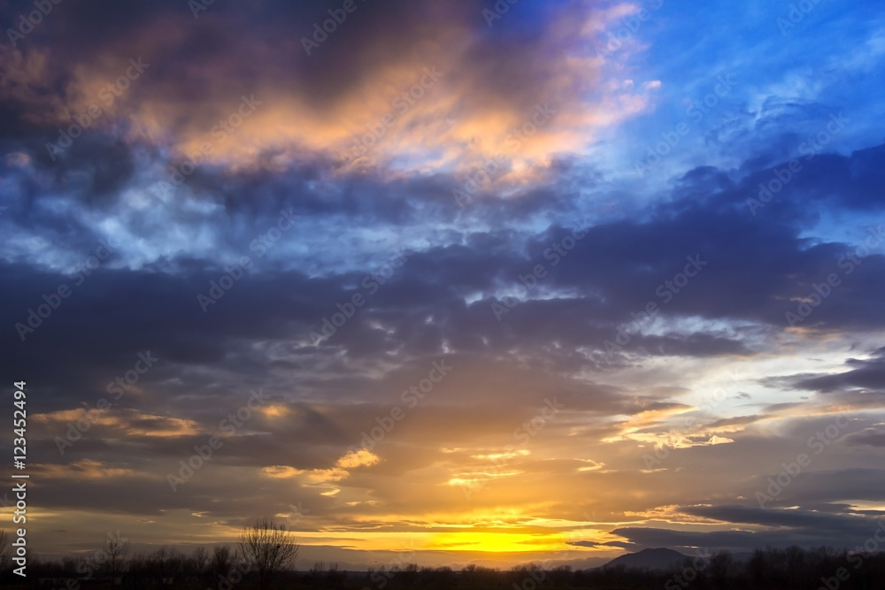 Landscape Dramatic sunset and sunrise sky with a silhouette of t