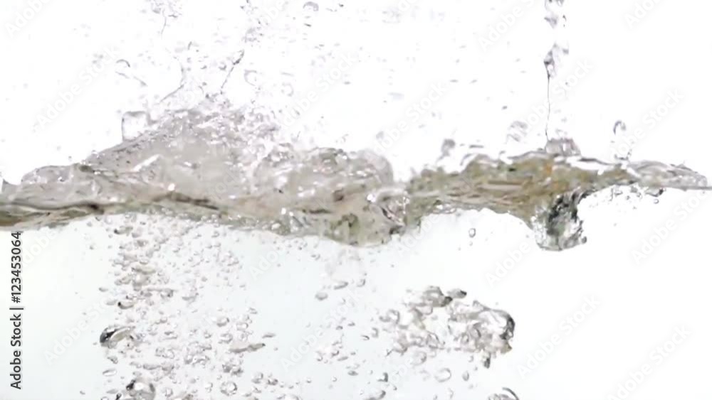 Fruits falling into water on white background slow motion HD video. Water surface with floating whole grape, orange, splash bubbles and waves. Fruits falling into water on white background slow motion HD video. Water surface with floating whole grape, orange, splash bubbles and waves.