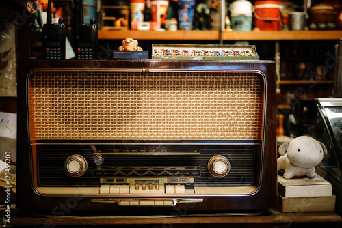 A table with an old vintage radio in cafe