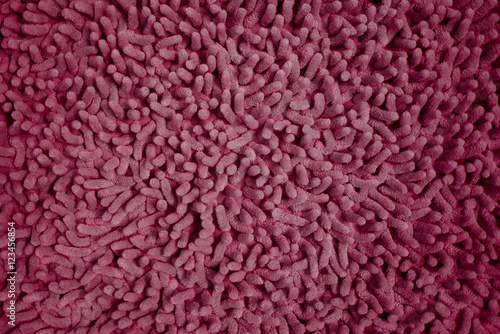 red cleaning doormat or carpet texture