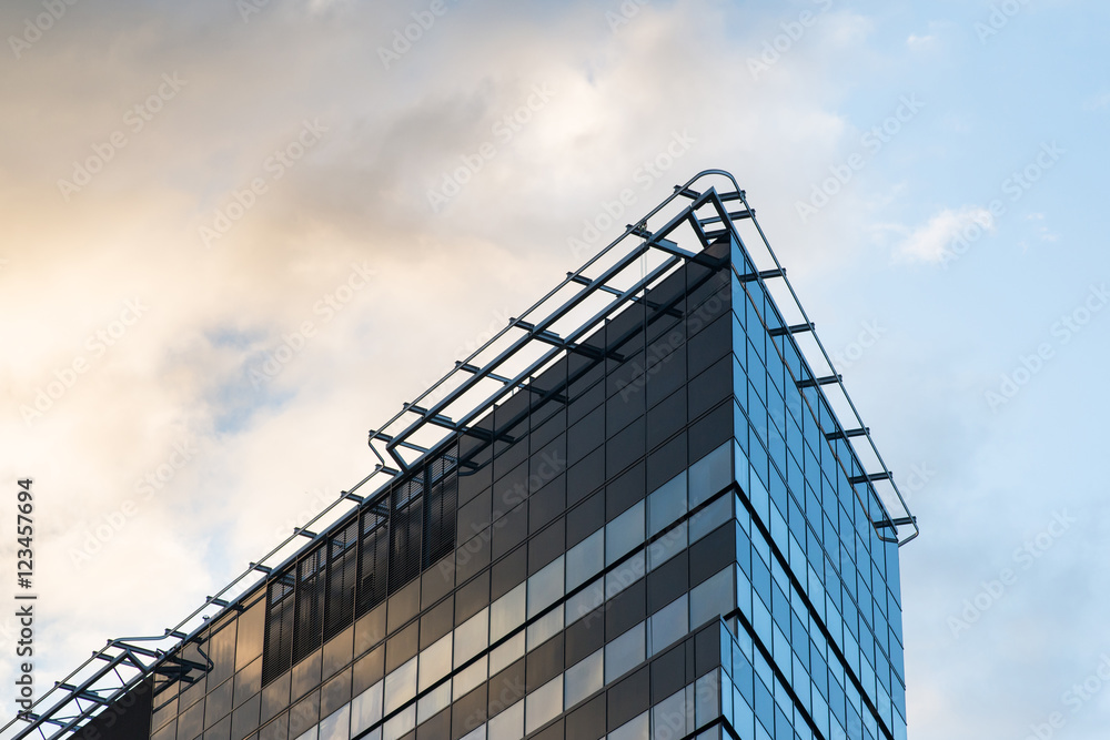 Modern office building with cloudy sky Modern office building with cloudy sky