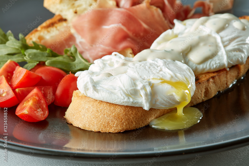 Poached egg on piece of wholegrain bread Poached egg on piece of wholegrain bread