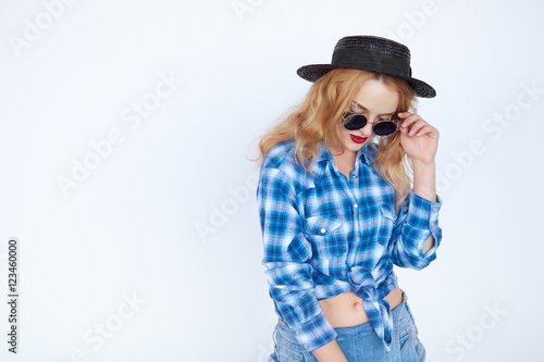 blond hair woman dressed in a blue shirt isolated on white