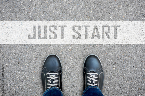Black casual shoes standing at just start line