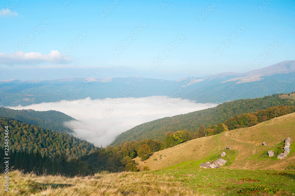 Naklejka premium Foggy mountain landscape