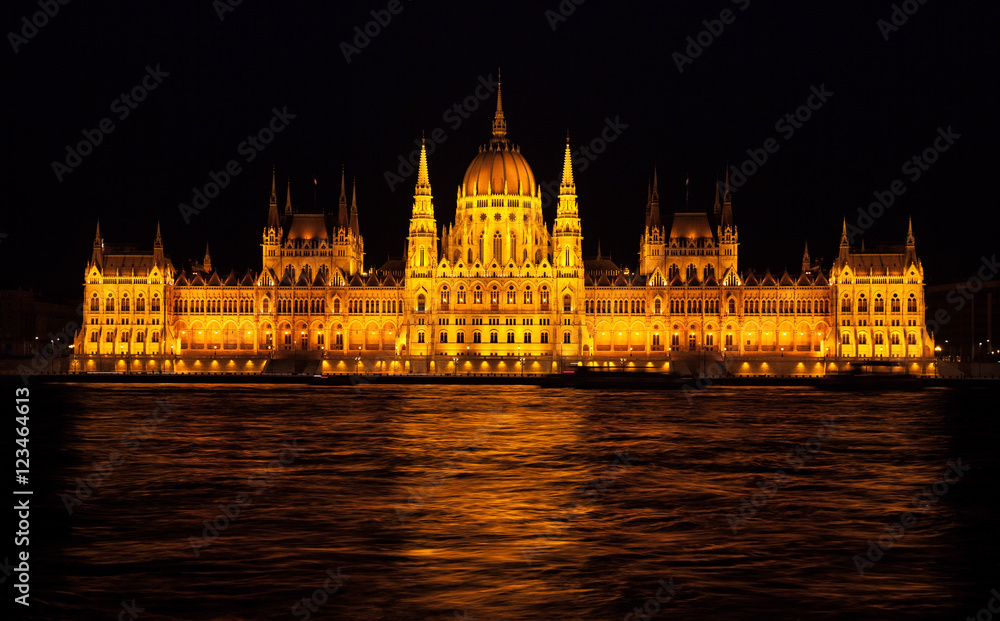 Building of Budapest parliament with nighttime illumination