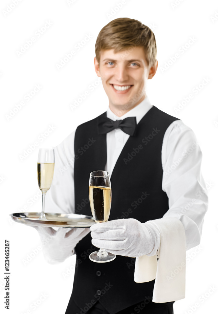 Happy smiling waiter serving champagne on a tray Happy smiling waiter serving champagne on a tray