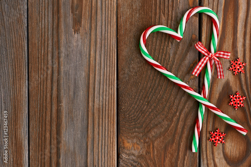Christmas cane on wooden background
