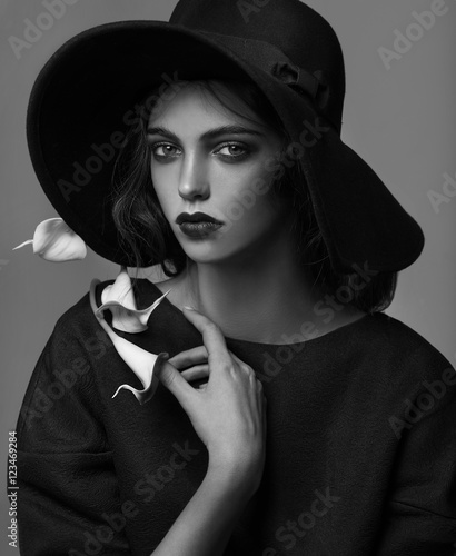 Portrait of elegant woman wearing hat  (ID: 123469284)