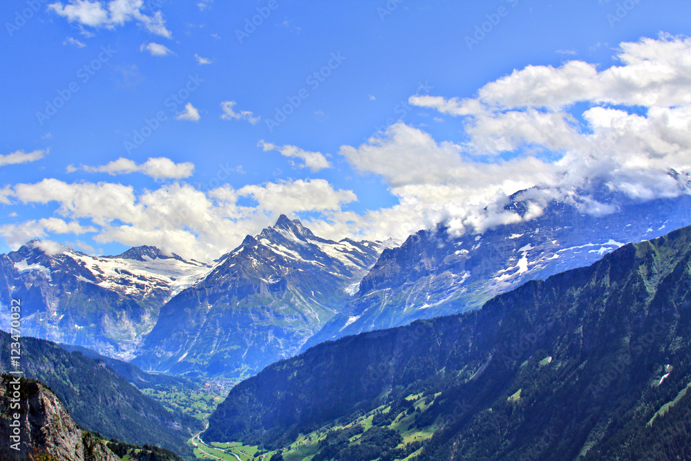 Panoramic view of the Alps in Switzerland on a hot summer day Panoramic view of the Alps in Switzerland on a hot summer day